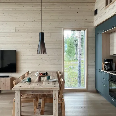 Lumikero - Korkeatasoinen Järvenrantahuvila Tunturinäkymällä Huvilat